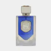 liam-blue-shine-perfume-bottle-surrounded-with-amber-and-citrus-against-white-background