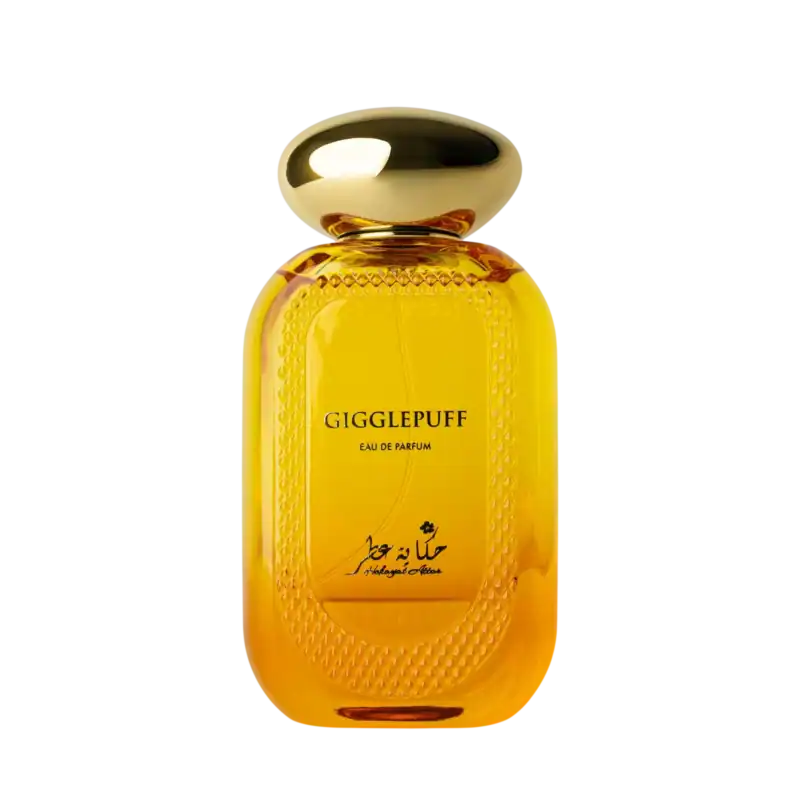 Elegant yellow perfume bottle with gold cap for Gigglepuff by Hekayat Attar.