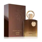 Elegant Oud perfume bottle with gold accents and packaging.