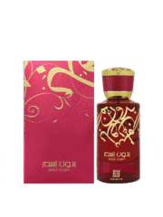 Perfume Bottle with Red and Gold Design.