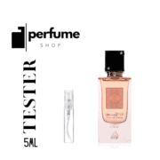 Elegant Ana Abiyedh Coral perfume bottle with black cap and pink fragrance, perfect for women.